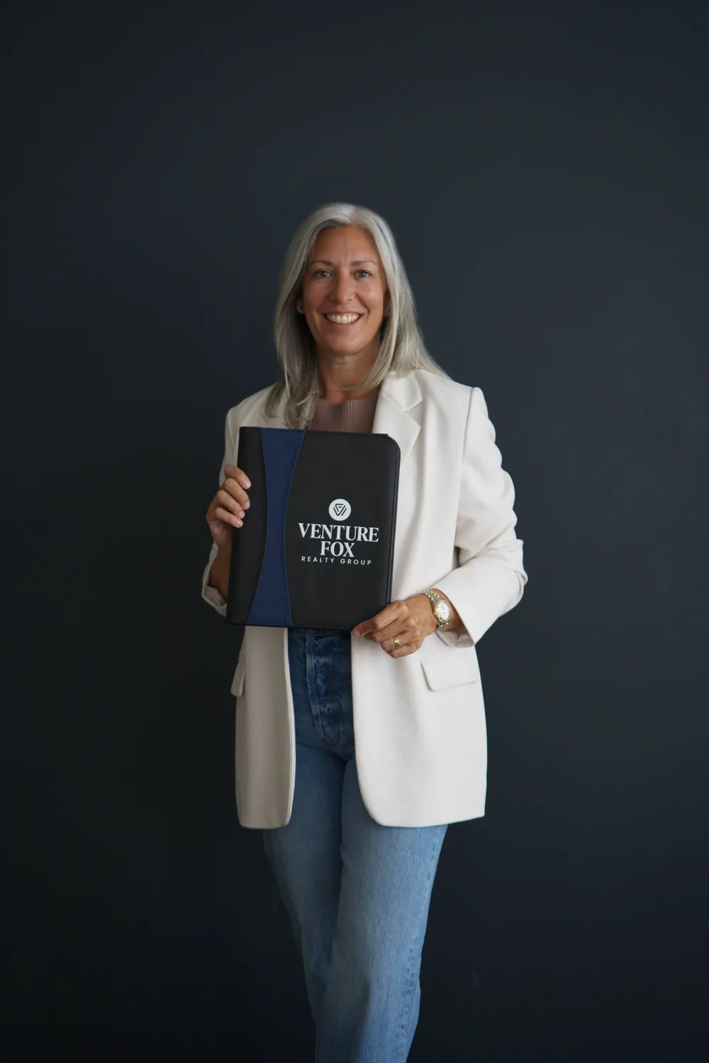 Jamie holding a Venture Fox folio